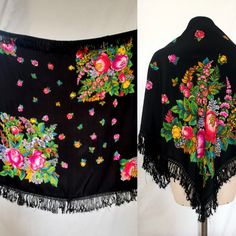 This is a beautiful square shawl, I believe from the 1930's, 40's out of black rayon with vibrant multicolor floral pattern. Black silk short fringe, that originally might have been longer. Such a cheerful, charming piece with foklore vibes. Measures  96cm×95cm/37.7"×37.4" Fringe 6cm/2.4" In very good vintage condition, with no visible flaws. If you have any questions please feel free to contact me, thank you for watching.  International and local shipping signed for with tracking number. Vintage Shawl Scarves For Summer, Vintage Summer Shawl Scarves, Festive Black Shawl With Floral Embroidery, Vintage Summer Shawl Scarf, Black Bohemian Shawl With Embroidered Border, Bohemian Black Shawl With Woven Motifs, Vintage Multicolor Silk Shawl, Black Embroidered Silk Shawl, Vintage Multicolor Floral Print Shawl