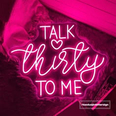 a neon sign that says talk thirty to me