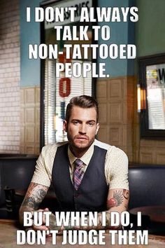 a man sitting at a table with a tattoo on his arm and the caption says, i don't always talk to non - tattooed people but when do i don't judge them