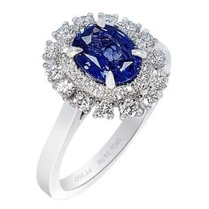 a blue and white diamond ring