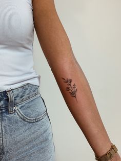 Tattoo flower small mini tattooart flowers cute little inked ink inspiration fineline Dainty Flower Bouquet Tattoo Placement, Floral Dainty Tattoo, Fine Line Flower Tattoo Back Of Arm, Back Of Forearm Flower Tattoo, Simple Flower Arm Tattoos For Women, Dainty Lower Arm Tattoos, May Flower Bouquet Tattoo, Flower Fine Line Tattoo Arm, Birth Flower Tattoos On Wrist