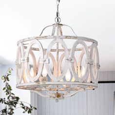 a white chandelier hanging from the ceiling