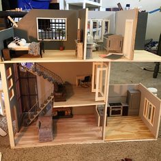 a doll house is shown with all the furniture and accessories in it's display case