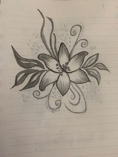 a drawing of a flower on lined paper with water droplets and swirls around it