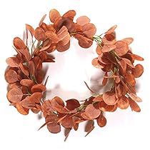 a close up of a wreath on a white background