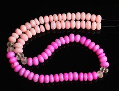 three pink and white beaded bracelets on a black background, one with glass beads