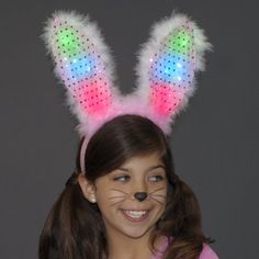 Light Up Bunny Ears Headband Pink and White are a fun and playful item for all ages to enjoy. They're especially great for Easter and Halloween! Be a cute bunny or a light up rabbit. To activate them, simply turn the switch located on the back of the head band to the ON position. One size fits most. Make any ordinary night into an extraordinary night! NOTE: The Light Up Bunny Ears are bendable, but do not bend on their own. Dimensions: Height: Approx.10.25 in. Width: Approx.9.5 in. LED Colors: 2 Playful Multicolor Headband For Party, Cute Halloween Party Headband, Fun Multicolor Headband For Gift, Fun Multicolor Headband For Gifts, Fun Multicolor Headband As Gift, Cute Adjustable Halloween Headband, Fun Pink Adjustable Costume Accessories, Adjustable Multicolor Headband For Costume Party, Novelty Bunny Ears For Party Costume Accessories