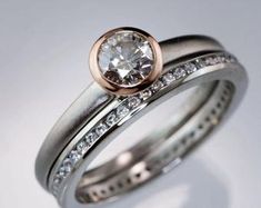 two wedding rings with diamonds on each one and the other in rose gold, silver or white gold