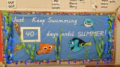 a bulletin board that says just keep summing 40 days until summer with fish and seaweed