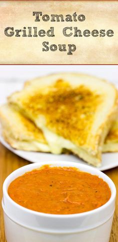 tomato grilled cheese soup in a white bowl with toasted bread on the side