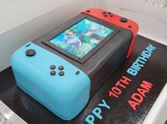 a birthday cake made to look like a video game console