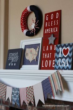 a mantle with patriotic decorations and pictures on it