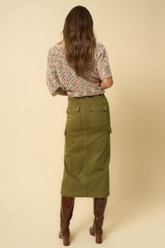 - 100% Cotton- Non-Stretch Denim- Color Cargo Skirt- Front Zipper Fly- 7 pocketsModel is wearing size S . Height 5'8Waist 28"Hip 36"Front Rise 30"Sweep 35" Style: Casual Print / Pattern: Olive Dye Wash Silhouette: Cargo Fit: Midi Embellishment: 7 Pockets Neck Line: N/A Sleeve: N/A Length: Midi Closure: Button Closure Lining: No Care Instructions: Machine Wash ColdSize Measurement (inch): S: 28.0 (Waist), 36.0 (Hips), null (Inseam), 30.0 (Length) M: 30.0 (Waist), 38.0 (Hips), null (Inseam), 30.2 Olive Utility Bottoms For Fall, Olive Bottoms With Side Pockets For Spring, Spring Olive Bottoms With Side Pockets, Green Utility Mini Skirt, Fall Cotton Skirt With Patch Pockets, Cotton Skirt With Patch Pockets For Fall, Spring High Rise Cargo Skirt With Pockets, Spring High-rise Cargo Skirt With Pockets, Fall Cotton Skirt With Cargo Pockets