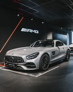 the mercedes amg gt is on display at an auto show