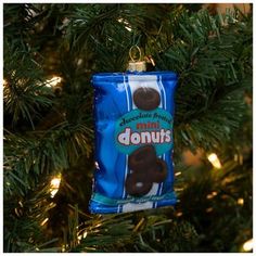 a bag of chocolate donuts hanging from a christmas tree