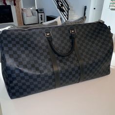 Louis Vuitton Keepall Bandoulire 55. 8 Months Old. Minimal Wear And Tear. Louis Vuitton Duffle, Louis Vuitton Duffle Bag, Bags Louis Vuitton, Louis Vuitton Keepall, 8 Months, Louis Vuitton Bags, Duffel Bag, Louis Vuitton Bag, Black Blue