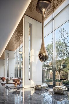 an elegant living room with large glass windows