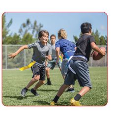 a group of young boys playing a game of frisbee