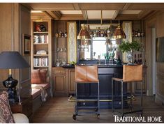 a home bar with two chairs in front of it