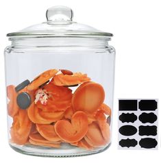 a glass jar filled with lots of orange peels