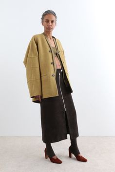 Oversized liner coat cut from ultra-soft, finely spun wool. Fully reversible—can be worn in light brown or cool sencha. Features a baseball collar, drop shoulders, and a three-button front. Includes a zippered chest pocket and two large patch pockets for added functionality. 100% Wool Button front closure Single zipper pocket Two patch pockets Made in China Arket Wool, Wedge Heel Boots, Colorful Scarf, Short Jumpsuit, China Fashion, Knit Skirt, Wool Blazer