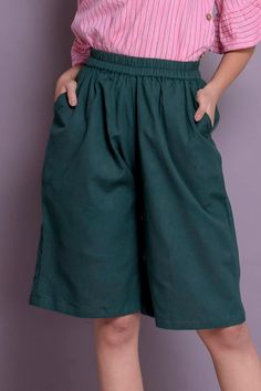 "Linen short pants, Skirt shorts, Short palazzo pants, Knee length pants, Wide leg short pants - Custom made by Modernmoveboutique. >DESCRIPTION< - Length of the pants - 24\" (61 cm) - If you want to customize the length, please mention in 'Note to seller' section while ordering these pants. - loose and roomy. - made from Linen blend. The fabric is of medium weight (185 g). - the model is 172 cm high (regular XS - S) and is wearing size S. - color or pattern in the picture - BOTTLE GREEN ( Knee-length Capris With Pockets, Solid Knee-length Shorts For Spring, Wide Leg Shorts With Built-in Shorts, Casual Solid Knee-length Pants, Knee-length Bottoms With Side Pockets For Spring, Spring Knee-length Pants With Elastic Waistband, Casual Knee-length Pants, Summer Capris With Built-in Shorts, Solid Color Knee-length Capris With Elastic Waistband