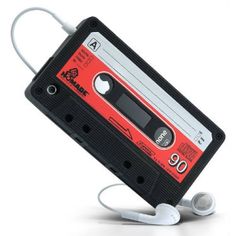 an old fashioned cassette tape with earphones attached to it