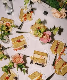 several slices of cake on plates with flowers