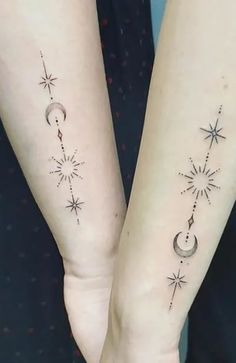 two people with matching tattoos on their legs, one has a crescent and the other has stars