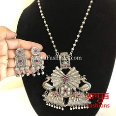 Siya Ethnic Oxidized Silver Long Statement Necklace in Pink Stones Metal Chandbali Necklaces For Diwali, Chandbali Necklaces With Latkans For Gifts, Navratri Temple Jewelry Metal Necklaces, Metal Temple Jewelry Necklaces For Navratri, Metal Necklaces For Diwali Festival, Traditional Diwali Pendant Jewelry, Diwali Temple Jewelry Style Metal Necklaces, Bohemian Temple Necklace With Tilla As Gift, Fusion Style Pendant Necklace For Rituals