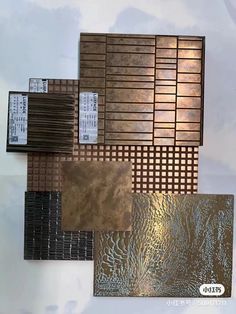 several different types of metal sheets are shown in various colors and sizes, including gold