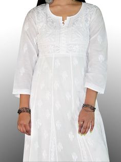 FREE PANT TCL Pure Cotton Kurta Lucknawi Chikankari Anarkali Ghaas Patti KurtiDisclaimer : : Motifs of embroidery may vary as the images shown are for illustration purpose.PRODUCT SPECIFICATIONSFabric : CottonSleeves : 3/4 SleevesStyle : Anarkali KurtiLength : Knee LengthOccasions : Casual Wear, Office Wear, Party WearPrice Includes : Only Cotton KurtiGarment Care : Hand Wash OnlyPRODUCT FEATURESFlawless finishingElegant looksAlluring patternsSkin friendlyShrink resistance White Self-design Kurta For Puja, Bohemian Kurta With Self Design For Transitional Season, Bohemian Kurta With Self Design, White Bohemian Self Design Kurta, Salwar Kameez With Chikankari Embroidery For Puja And Navratri, Fitted White Salwar Kameez For Puja, Bohemian Kurta With Cutdana For Puja, Anarkali Kurta With Chikankari Embroidery For Puja, White Salwar Kameez With Self Design For Puja