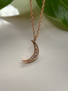 Dainty Diamond Moon Necklace  Pendant in 14k rose gold.This necklace is perfect by itself or or layered. You can wear it day or night. This necklace is versatile and perfect as a gift. Effortlessly trendy and beautiful!Metal.......14k Rose gold Pure gold /  Finish.... polish Necklace.....Handmade in USA Diamond weight......0.10CTG - VS1 quality *14k rose  gold chain included *Chain sizes Available.. 16”, 18” , 20 inches long Elegant Rose Gold Charm Necklaces For Everyday, Rose Gold Charm Necklace With Delicate Chain, Elegant Rose Gold Charm Necklace As Gift For Her, Elegant Rose Gold Charm Necklace For Her, Elegant Rose Gold Round Charm Necklace, 14k Rose Gold Moon-shaped Jewelry, Fine Jewelry Crescent Necklace As Gift, Rose Gold Moon Necklace With Moon Charm, Elegant Rose Gold Charm Necklaces For Anniversary