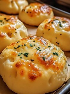 some food that is sitting on a baking sheet in the oven and ready to be eaten