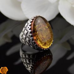 This finely detailed chunky ring observes a perfectly crafted cognac Baltic Amber hand-hammered in 925 Hallmarked Silver. Handcrafted to a standard of perfection will make a meaningful nature-inspired gift for a beloved husband, father, grandad or just a wonderful love token for yourself or your special someone. Wrapped up with love in a luxury gift box. RING SIZE GUIDE UK H = US 4 UK J = US 5 UK L = US 6 UK N = US 7 UK P = US 8 UK R = US 9 UK T = US 10 Cognac Baltic Amber 40 - 90 million years Fat Finger, Silver Ring For Men, Unique Promise Rings, Mens Gemstone Rings, J Us, Amber Ring, Chunky Rings, Bead Set, Mens Silver Rings