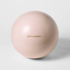 an all in motion ball sitting on top of a white surface with the words'all in motion'written on it