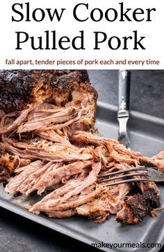 slow cooker pulled pork on a plate with fork and knife