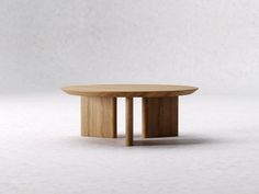 a round wooden table on a white background