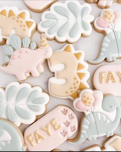 some cookies that are decorated to look like baby animals and the words fave on them