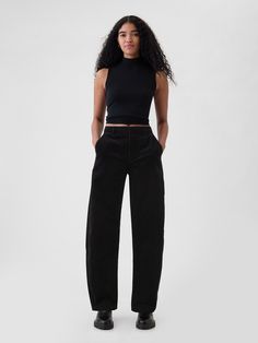 Soft corduroy tapered trousers.  E-waist with concealed hook and bar closure, zip fly.  Front slant pockets, back welt pockets.  Fit: Classic.  An easy silhouette that fits close  at the waist, and is relaxed through the hips and thigh.  High rise.  Tapered leg.  Models wearing Gap