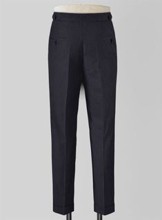 Elevate your formal demeanor with our Blue Merino Wool Highland Trousers. Crafted from a wool blend, the trousers being light in weight offers maximum breathability and are perfect for days when convenience is of equal importance to the style; also, the trouser's hue makes them versatile wear for summer, winter, corporate, or for pleasure.   
  Look Includes    Blue     Merino     Wool  Fabric  Cross Pocket  Forward 2 Pleats  Side Tabs (No Loops)- Arrow Shape  Bottom Cuff (1.5")  Two Welted Bac Elegant Suiting Fabric Bottoms For Office Wear, Elegant Bottoms In Suiting Fabric For Office, Wool Business Dress Pants, Business Casual Dress Pants In Suiting Fabric, Slim Fit Office Wear Bottoms In Suiting Fabric, Business Straight Pants In Suiting Fabric, Elegant Office Bottoms In Suiting Fabric, Wool Business Casual Long Pants, Business Casual Wool Tapered Leg Bottoms