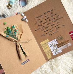 a handmade greeting card with flowers on it and a message written in cursive writing