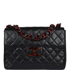 This vintage Chanel Jumbo Single flap bag is in black lambskin leather with tortoiseshell Bakelite hardware and features tonal stitching, a front flap with signature CC turnlock closure, half moon back pocket, and adjustable interwoven tortoiseshell Bakelite hardware chain link and black leather shoulder strap.The interior is lined in burgundy leather and has one zip pocket with a CC pull and a slip pocket underneath.Collection: 3-series (1994-1996)Origin: FranceCondition: Vintage; Excellent - T Luxury Brown Flap Bag, Designer Double Flap Bag With Leather Lining, Luxury Double Flap Shoulder Bag With Leather Lining, Luxury Black Double Flap Bag, Designer Black Double Flap Shoulder Bag, Designer Brown Shoulder Bag With Cc Turnlock Closure, Luxury Black Flap Bag With Cc Turnlock Closure, Brown Leather Bag With Cc Turnlock Closure, Vintage Black Bag With Cc Turnlock Closure