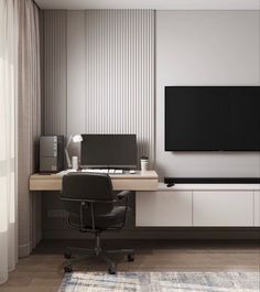 a room with a desk, chair and television on the wall