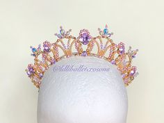 This ballet headpiece is entirely created with Swarovski elements, it's kinda little jewel. All the metallic wires used are gold and silver plated. They are extremely light, they are so comfortable and won't be a problem dancing with them. It's a unique piece hand made with high quality materials, in order to last in years. Even if it might seem fragile it's very resistant and doesn't oxidize by the passing of the time. It conserves its beauty and brilliance. It can be realised as you want, just Aurora Tiara, Fairy Tiara, Crystal Tiara, Sugar Plum Fairy