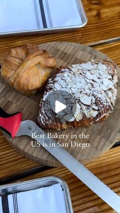 bread and croissants are on a cutting board