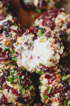 several balls of food with cranberry toppings