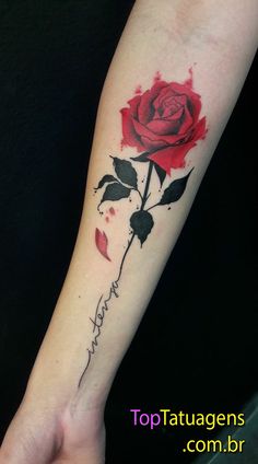 a red rose tattoo on the left inner arm and wrist with words written in cursive writing