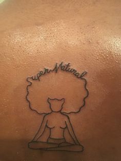 the back of a woman's neck with a tattoo on it that reads, susan natural