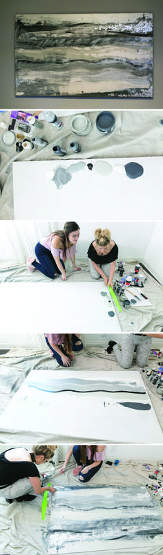 two women are working on some art work